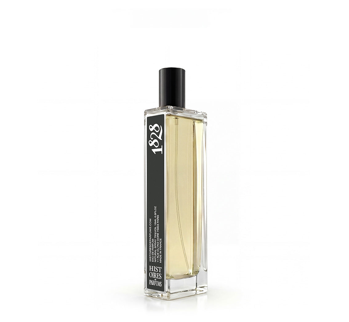 A 1828 glass perfume bottle with a black cap on a white background.